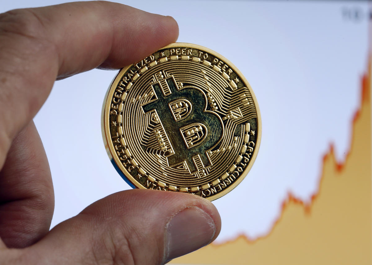 UPDATE 2-Bitcoin set for biggest monthly jump since amid ETF boost