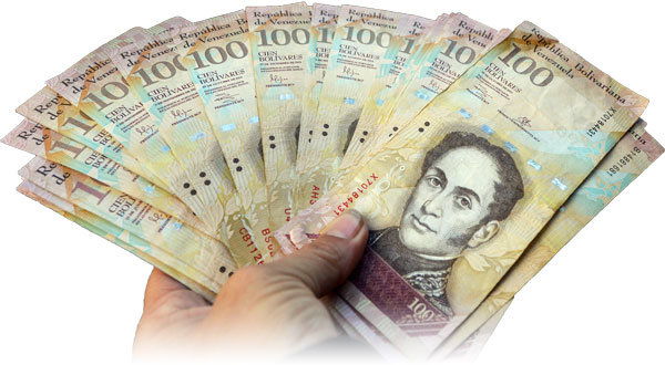 Venezuela's bolivar weakens against the U.S. dollar as inflation rages | Reuters