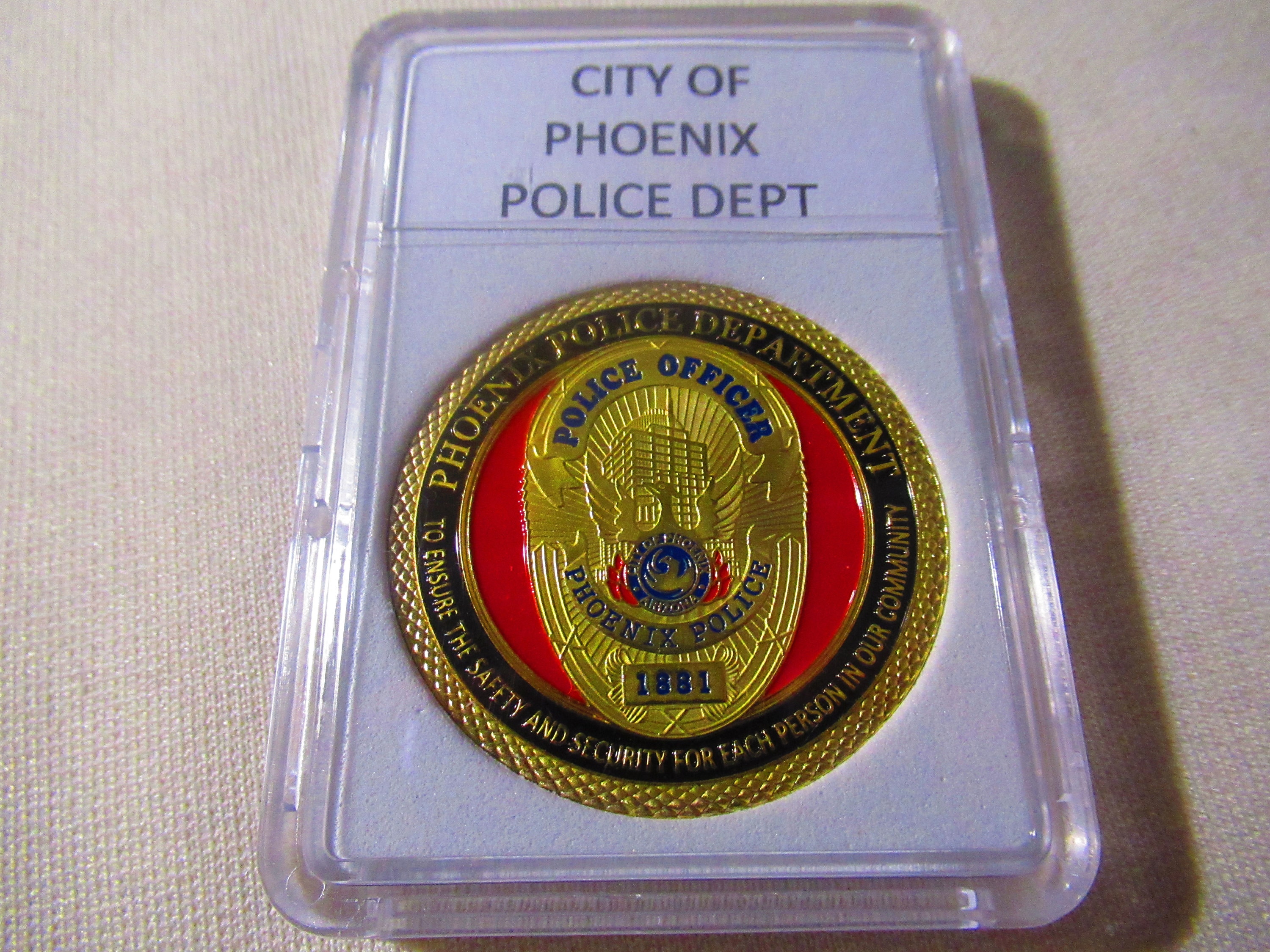 Phoenix police need our trust. This 'challenge coin' wipes it out