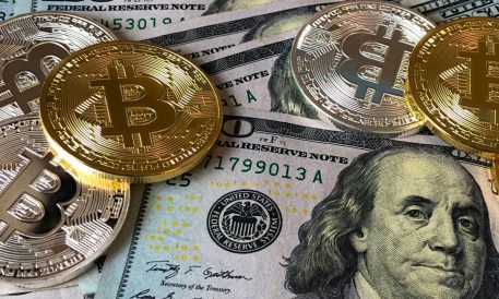 Bitcoin price tops $60, for first time since 