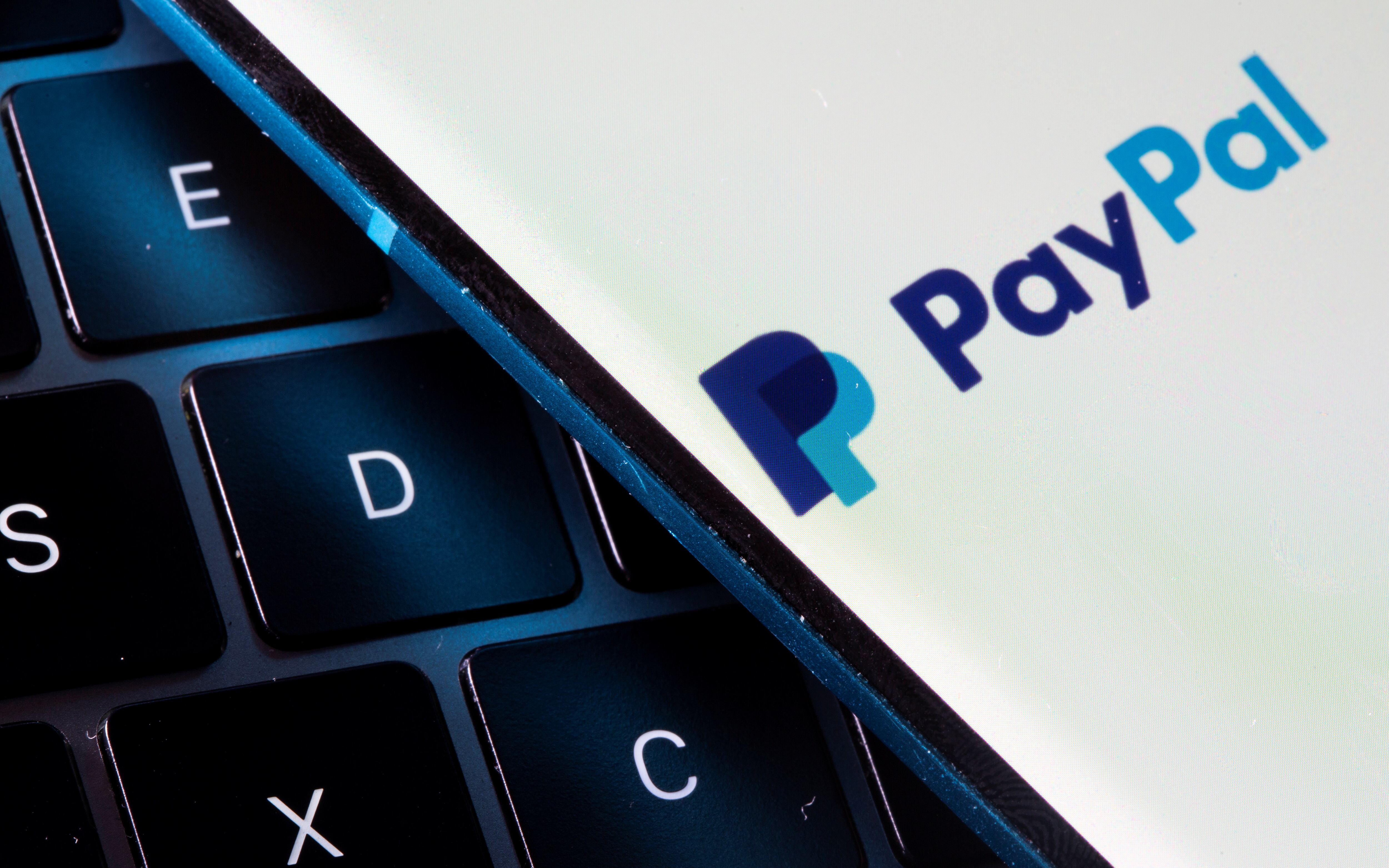 PayPal expands payments services to help Ukrainian citizens, refugees | Reuters