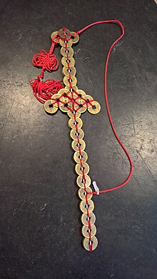 coin sword; amulet - Horniman Museum and Gardens